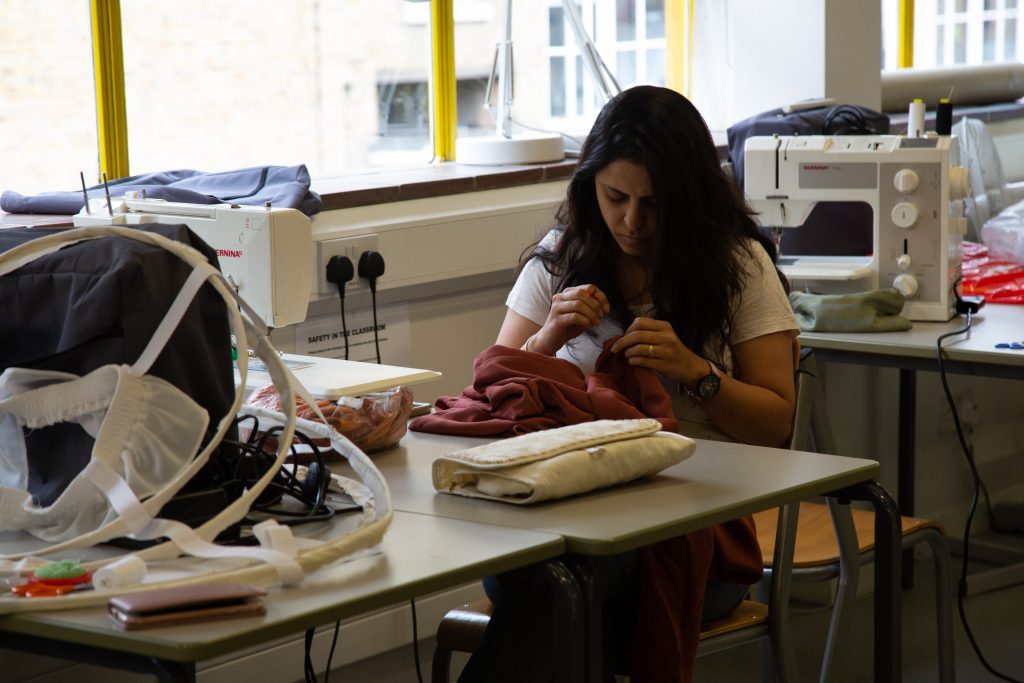 Woman at sewing machine