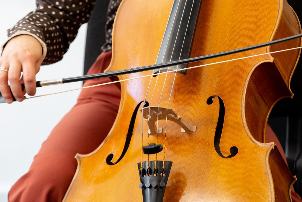 Student playing cello