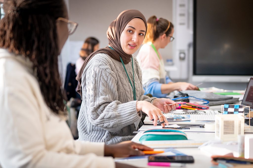 Women in classroom.