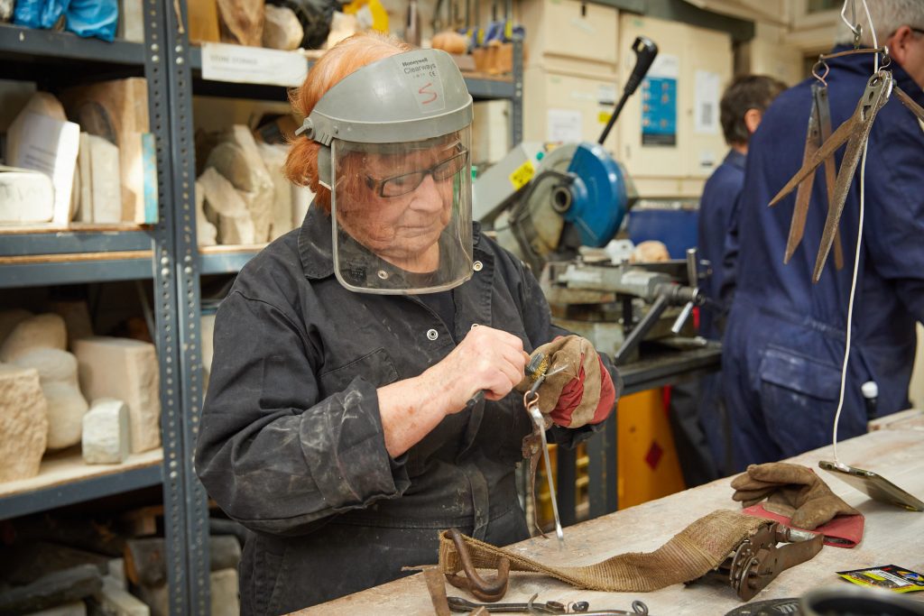 Student at a sculpture class