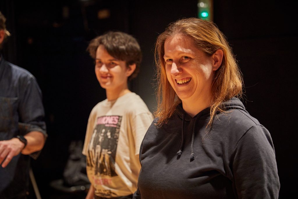 Woman and young man in acting studio