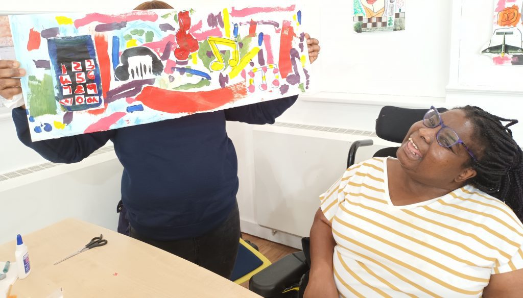 student with artwork